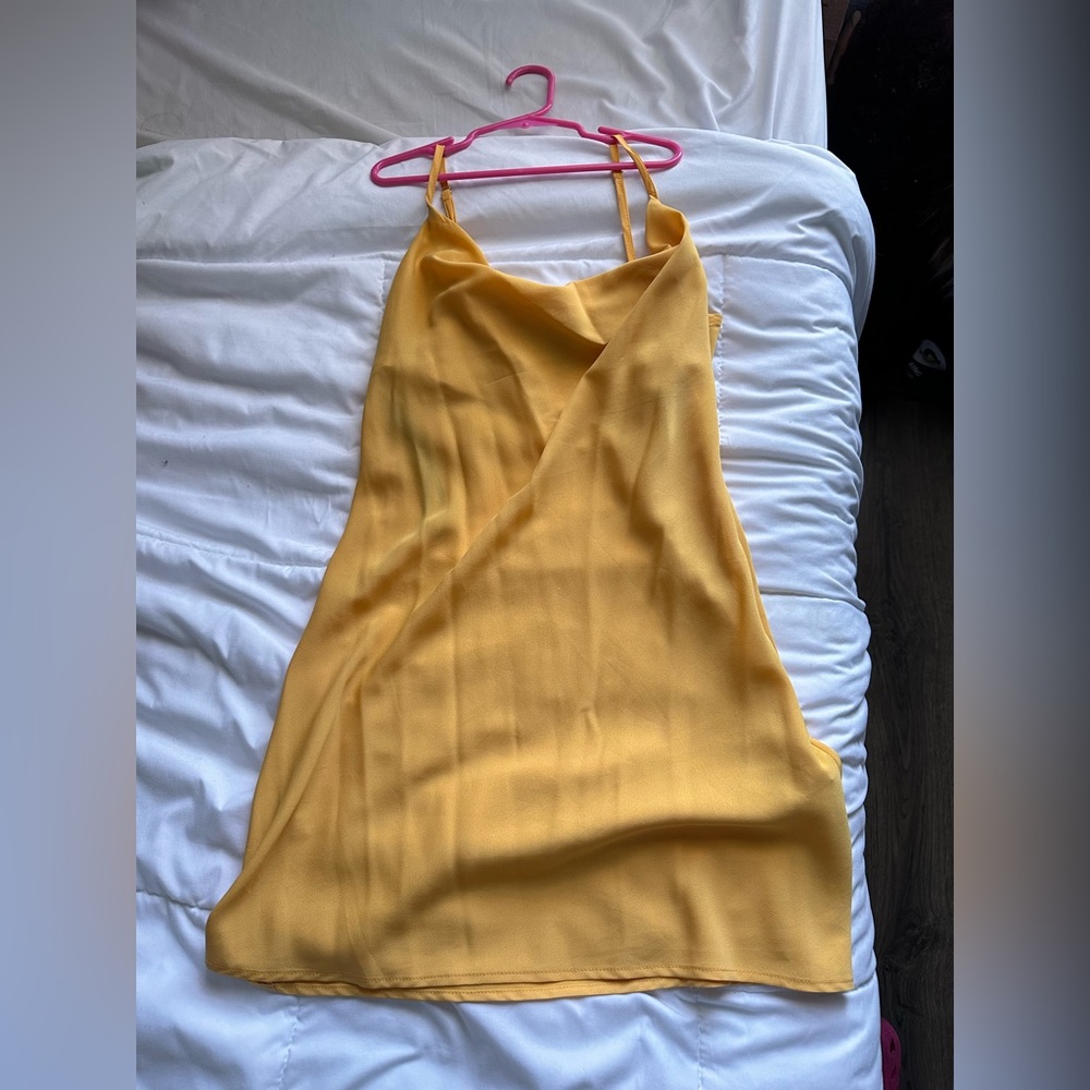 yellow, slightly see-through dress